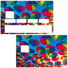 Load image into Gallery viewer, Les parapluies du soleil - Sticker pour carte bancaire, disponible en deux formats.