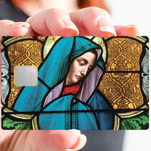 Load image into Gallery viewer, La vierge du vitrail - Sticker pour carte bancaire, disponible en deux formats.